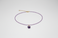 Colgante de Cristales violetas con estrella. IVA incluido.