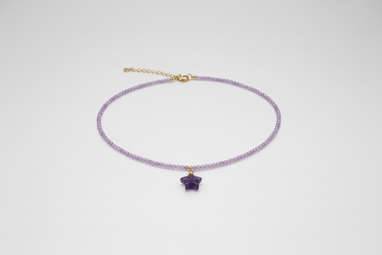 Colgante de Cristales violetas con estrella. IVA incluido.