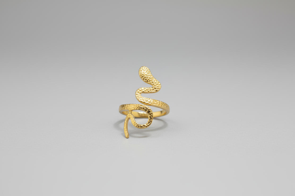 Anillo acero regulable serpioente dorada IVA incluido