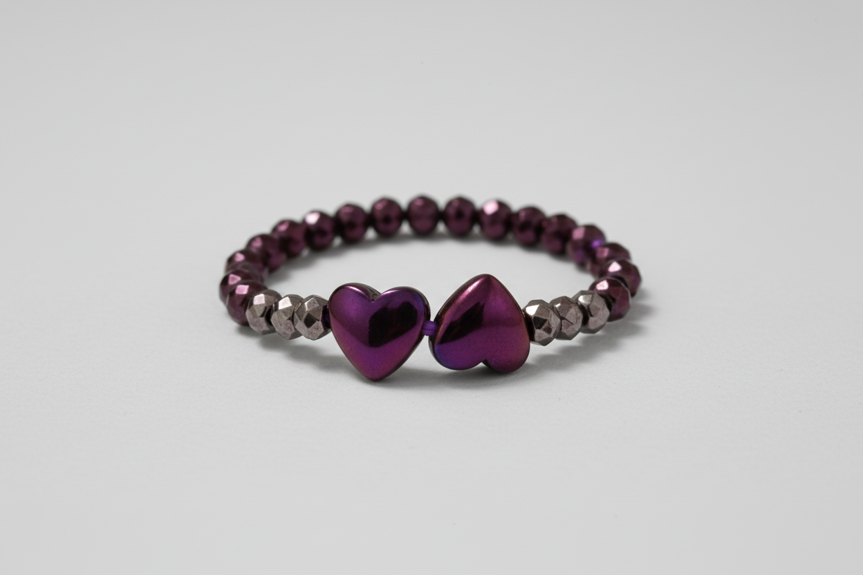 Anillo elástico corazones violeta y hematita. IVA incluido