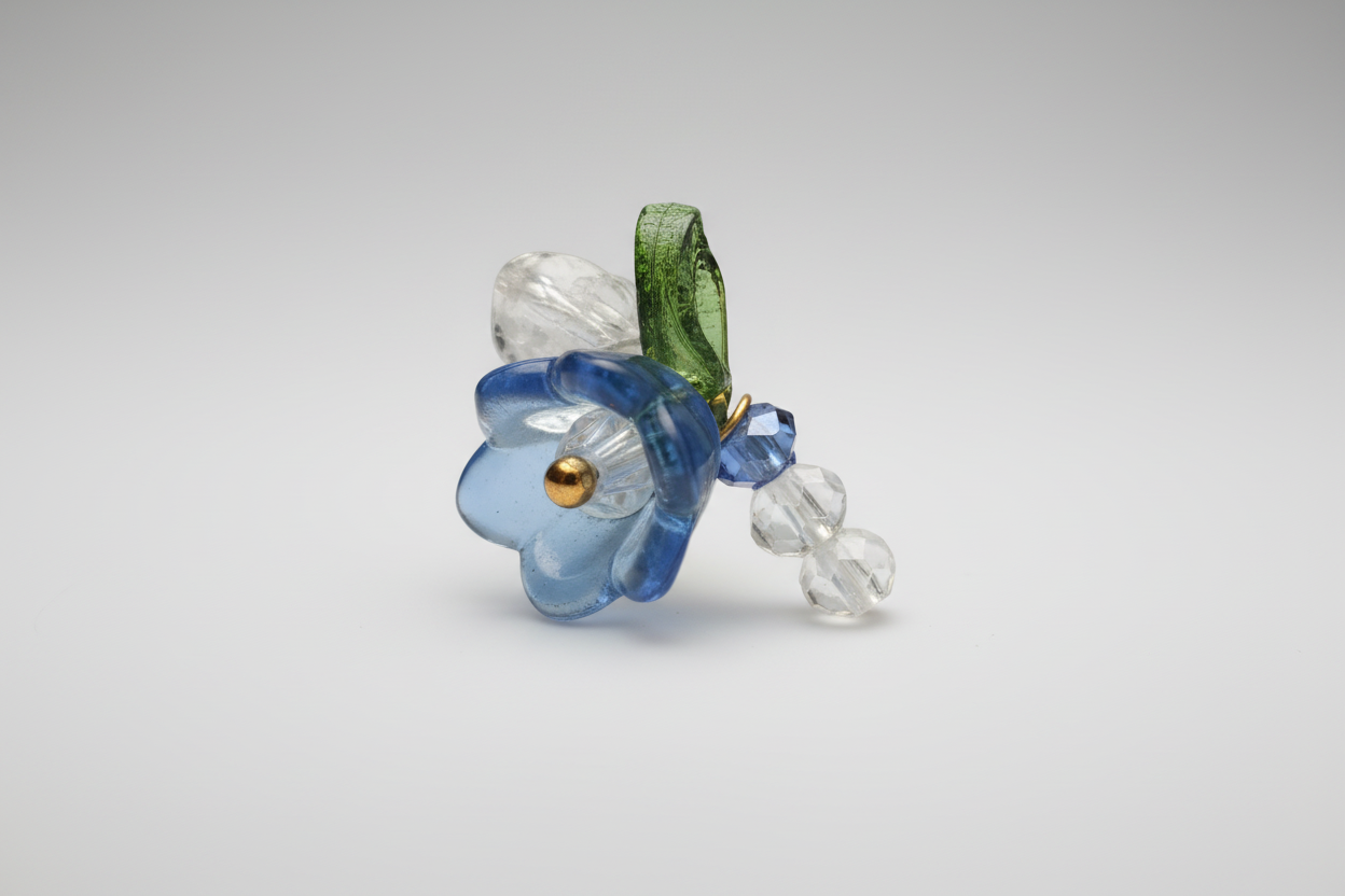 Anillo elástico flor azul y cristales IVA incluido