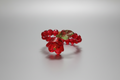 Anillo elástico de flor roja y cristales rojos IVA incluido