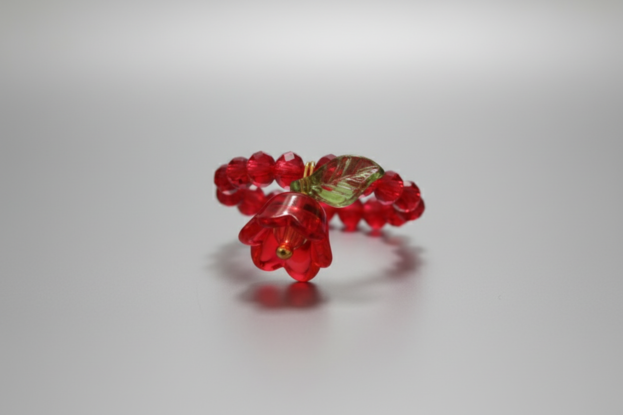 Anillo elástico de flor roja y cristales rojos IVA incluido
