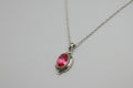 colgante  con obertura cristal rosa acero con cadena