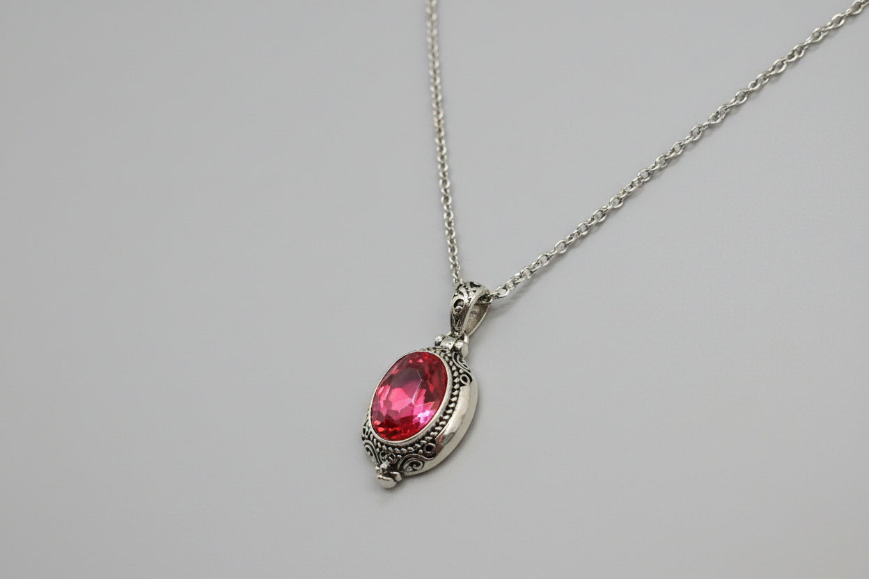 colgante  con obertura cristal rosa acero con cadena