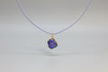 Colgante concha azul con cadena de cuerda violeta