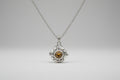 colgante aromaterápia acero con cristal amarillo