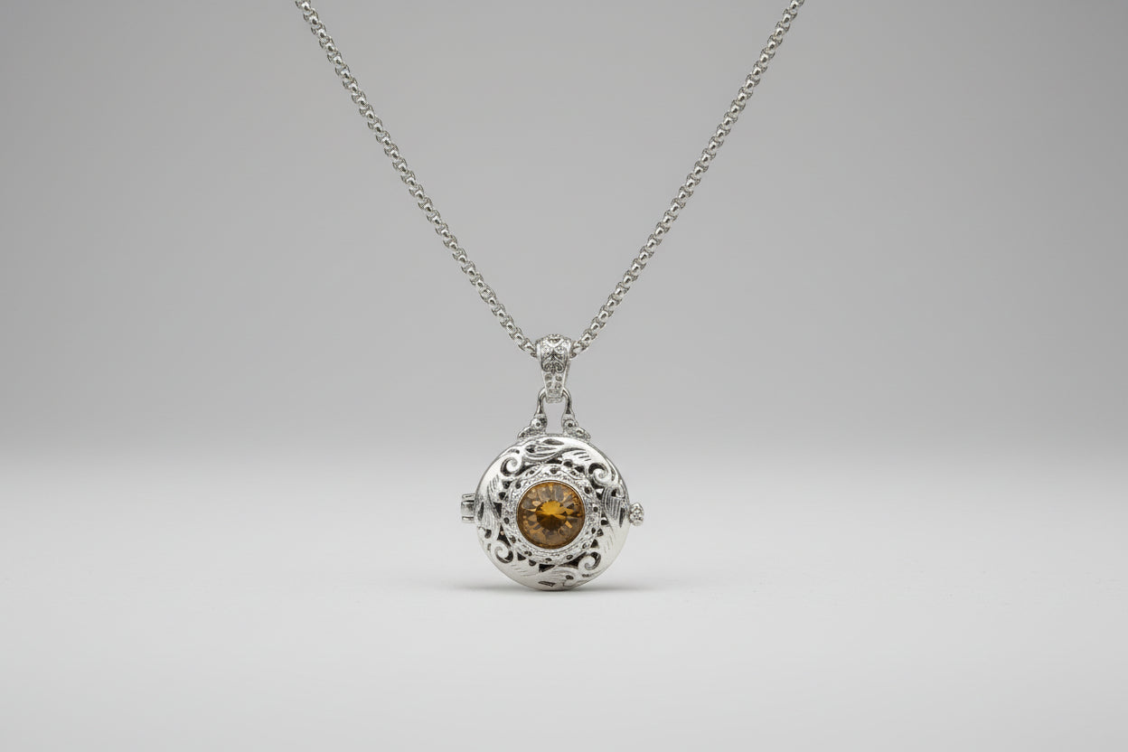 colgante aromaterápia acero con cristal amarillo