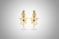 pendientes de acero dorado curz egipcia, con cristal negro en el centro.