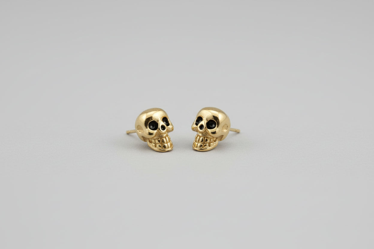 Pendientes calavera a cero dorado