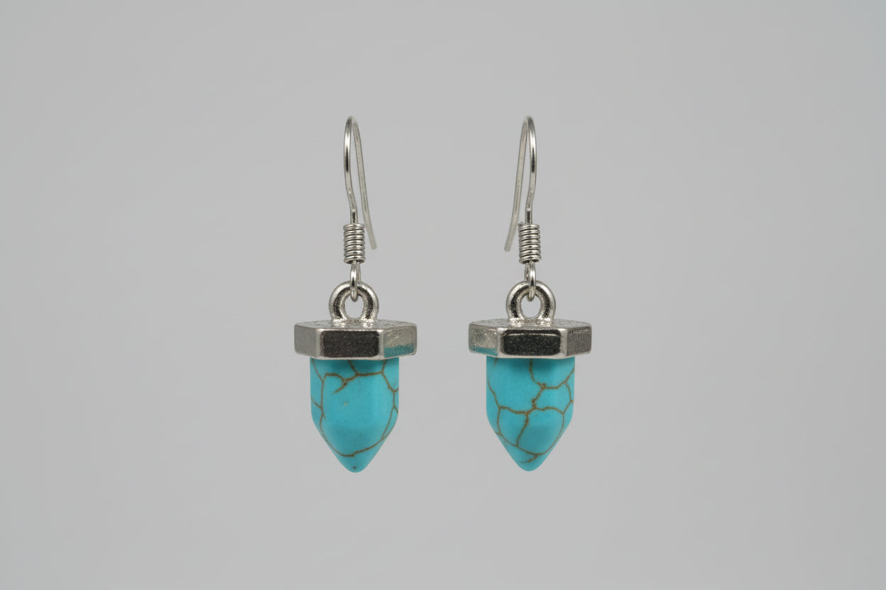 Pendientes con piedra azul acero. IVA incluida