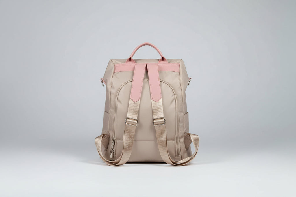 Bolso mochila color crema con bordados. IVA incluido