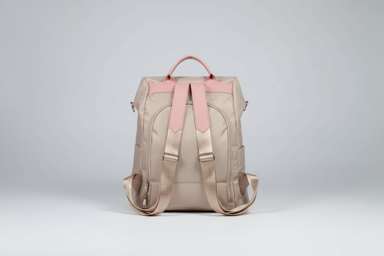 Bolso mochila color crema con bordados. IVA incluido