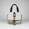 Bolso tela de algodón multicolor con aro de madera y  cuentas decorativas. IVA incluido