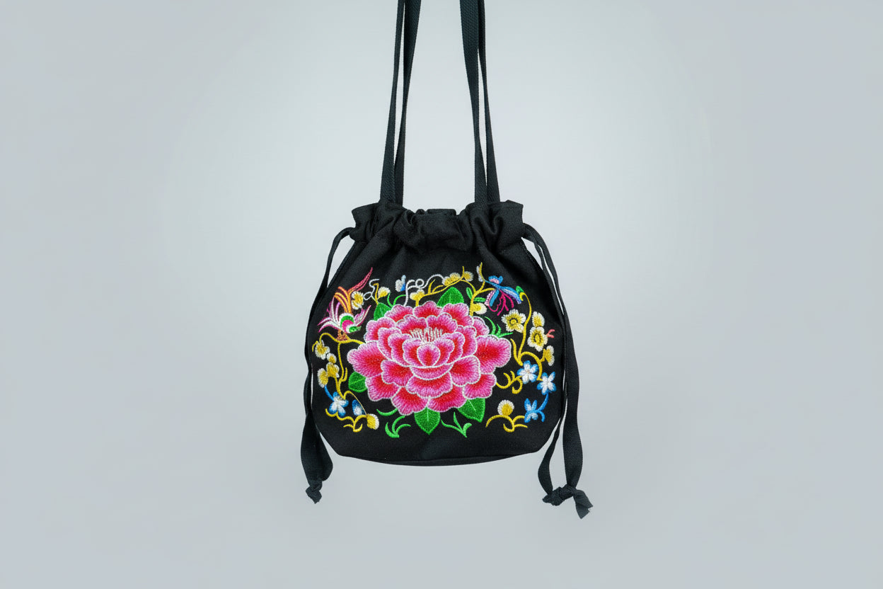 Bolso de tela algodón negro con flor bordada. IVA incluido