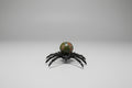 Araña de metal con Piedra Unakita. 5X6 cm. IVA incluido