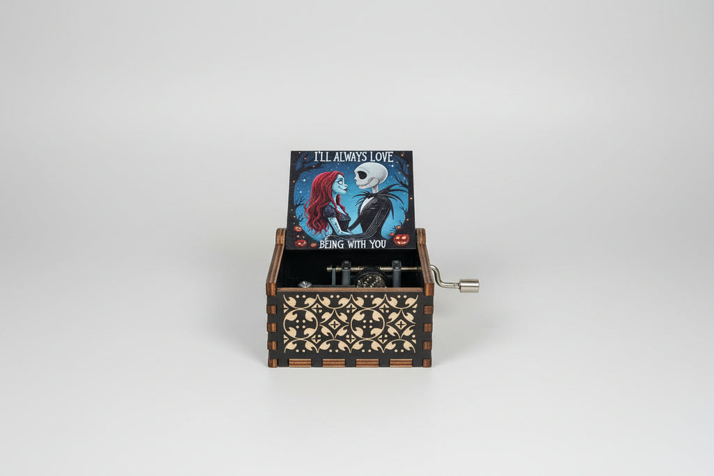 Cajita de música de madera película pesadilla antes de navidad 4X6 cm.IVA incluido.