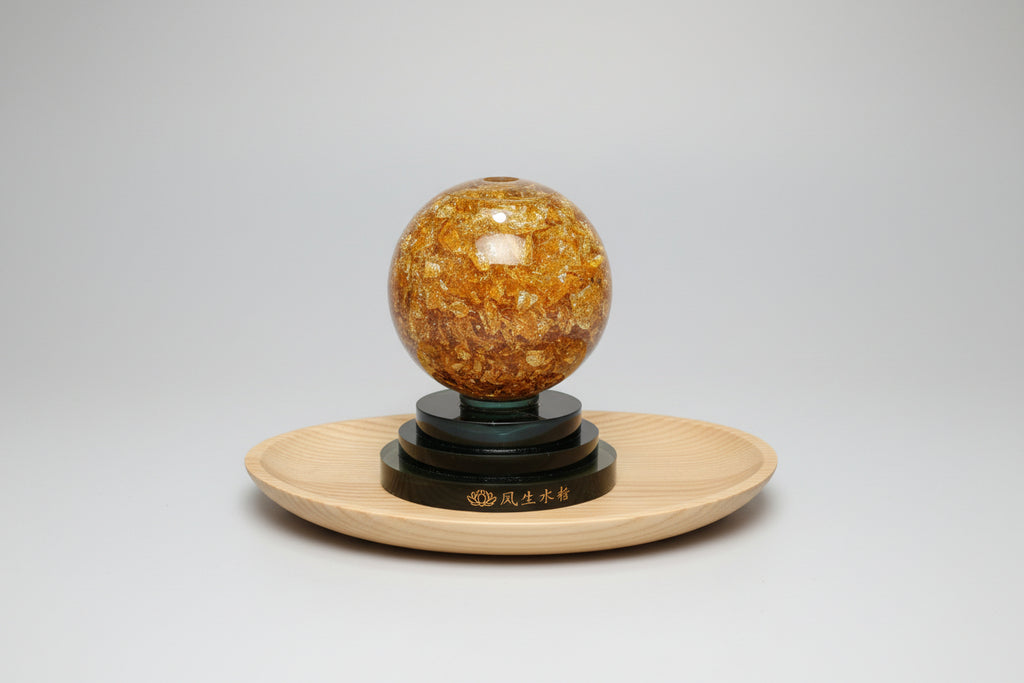 Bola de cristal gioratoria con pan de oro 11X9 cm. IVA incluido.