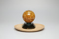 Bola de cristal gioratoria con pan de oro 11X9 cm. IVA incluido.