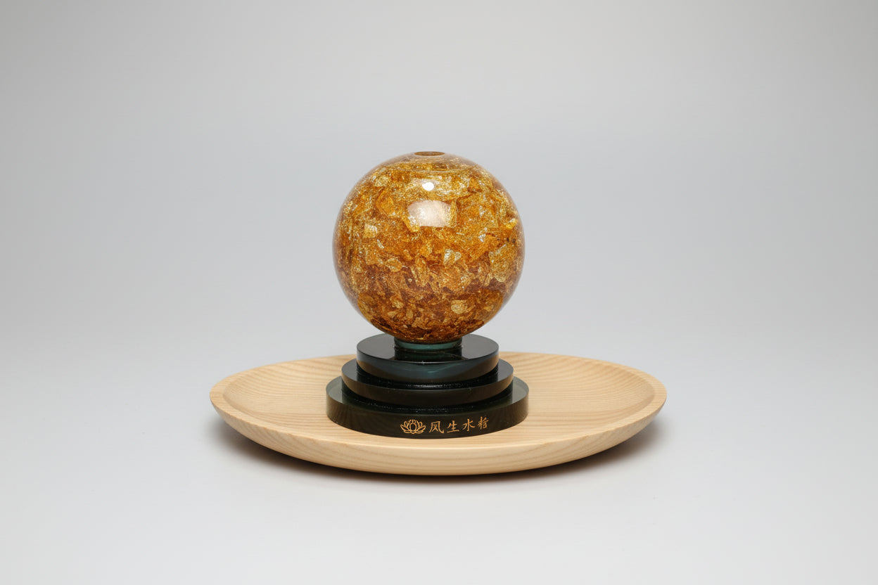 Bola de cristal gioratoria con pan de oro 11X9 cm. IVA incluido.