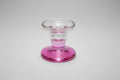 Porta vela  normal y tipo te, de cristal color rosa 7X7 cm. Vela no incluida. IV A incluido