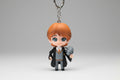 Llavero Harry Potter ( Ronald Weasley) con animal rata 9X5 cm. IVA incluido.