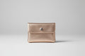 Monedero de piel color dorado 11X8 cm. IVA incluido