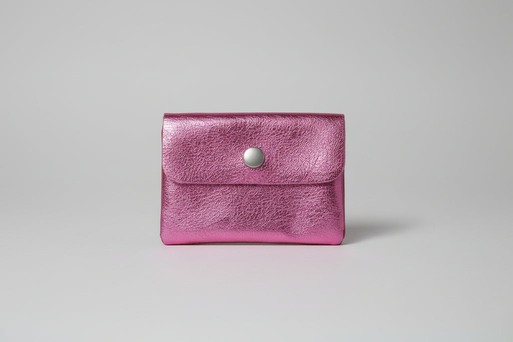 Monedero de piel color rosa fucsia 11X8 cm. IVA incluido