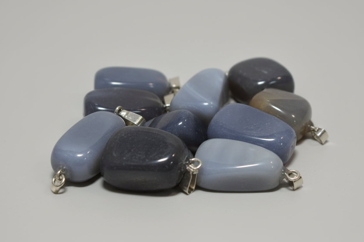Colgante de piedra Ágata Gris, no incluye cadena.IVA incluido