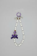 colgador de móvil  de cuentas de fantasía con lazo violeta con nudo de bruja y tetragrámaton. ( Diseño de Lubelia ) IVA incluido