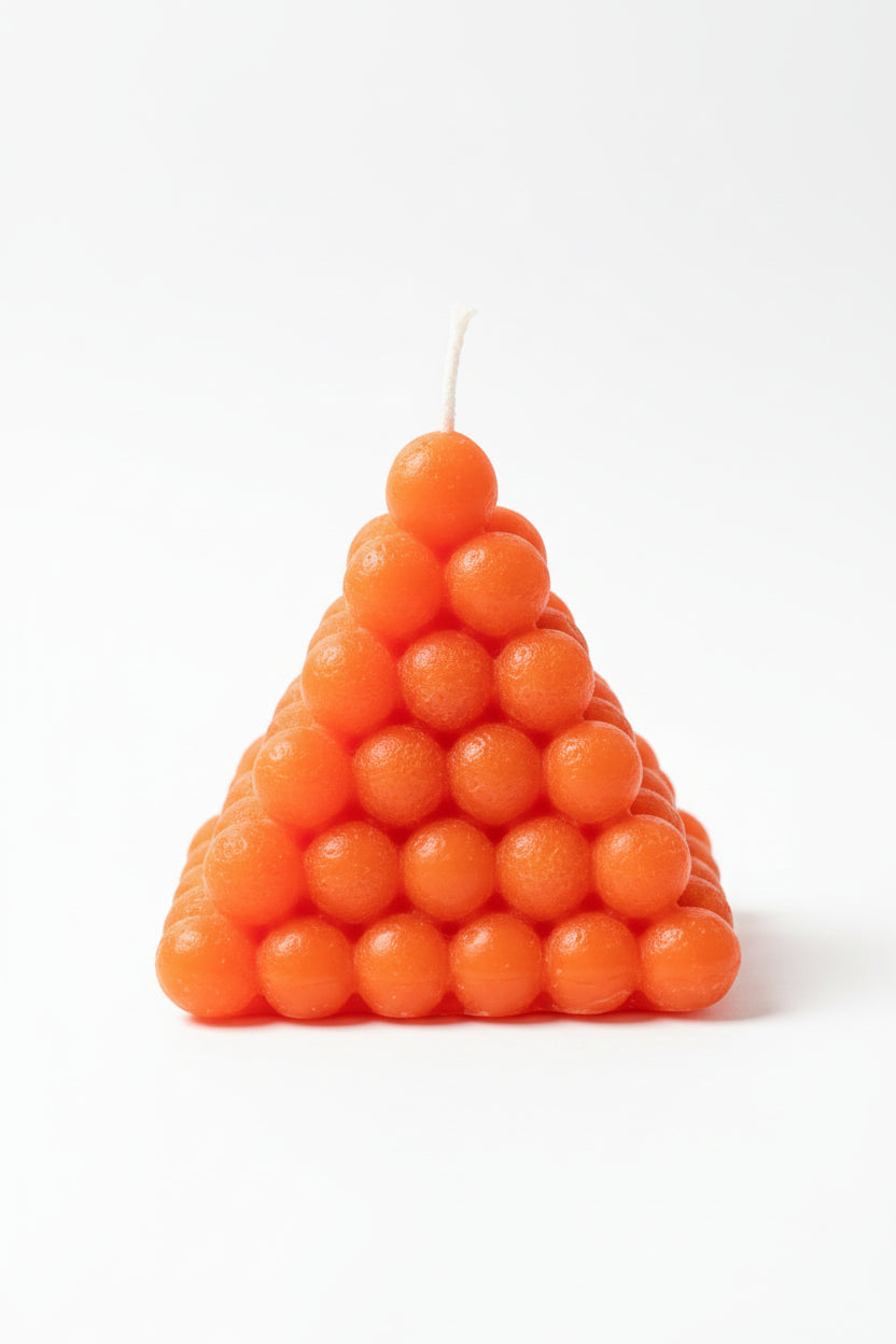 Vela Pirámide color naranja 6X5 cm. IVA incluido