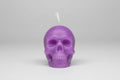 Vela calavera pequeña color violeta. IVA incluido.