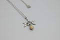 Colgante triple luna con tetragramatón acero piedra agata veteada( Diseño de Lubelia )