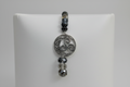 Pulsera de cuentas con cristales negros y grises con Trisquel luna ( Diseño de Lubelia ) IVA incluido