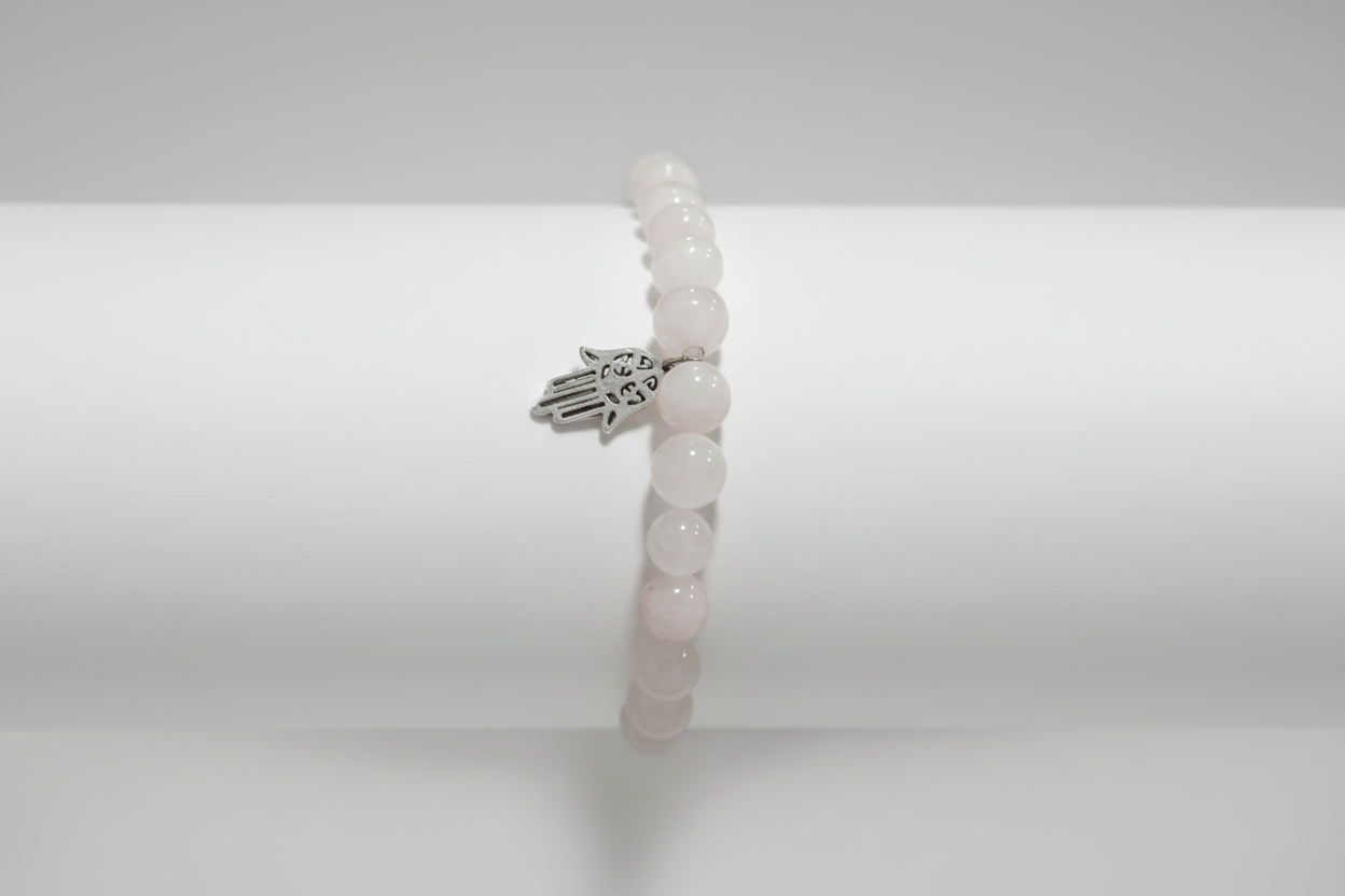 Pulsera de cuentas cuarzo rosa dije mano de Fátima. IVA incluido