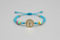 Pulsera de cuentas azul turquesa con cierre cuerda y árbol. IVA incluido