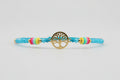 Pulsera de cuentas cristal azul cierre de cuerda y árbol. IVA incluido