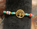 Pulsera de cuentas con cristal verde cierre cuerda y árbol. IVA incluido