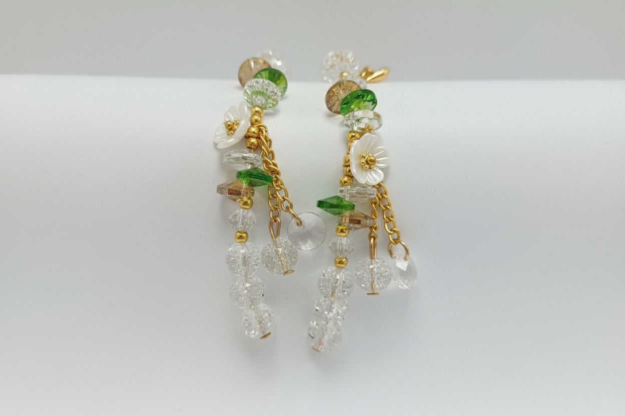 Pulsera de cuentas fantasía color cristal y flor. IVA incluido