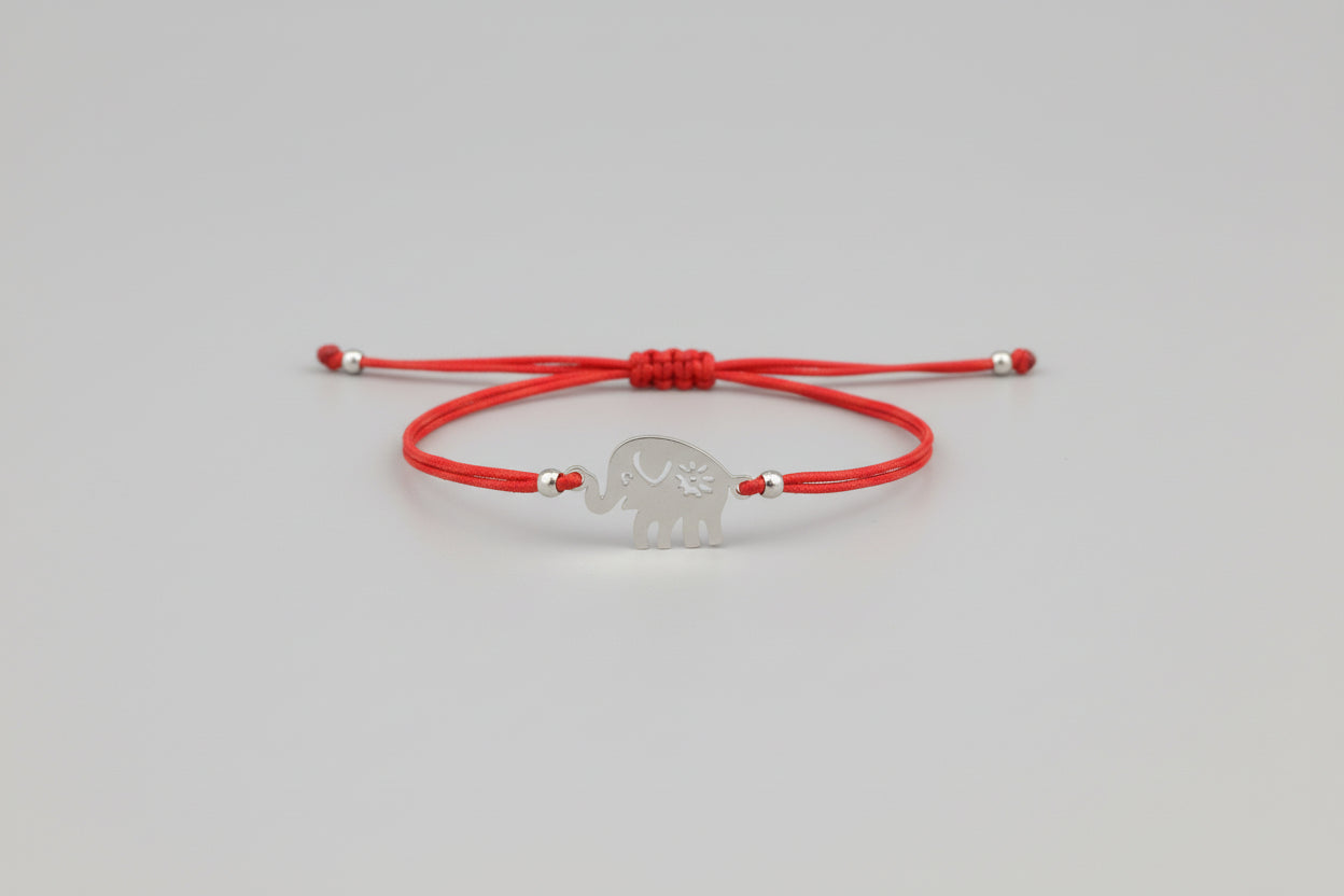 Pulsera elástica roja con amuleto elefante acero.IVA incluida
