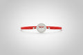 Pulsera elástica roja amuleto ojo acero. IVA incluido