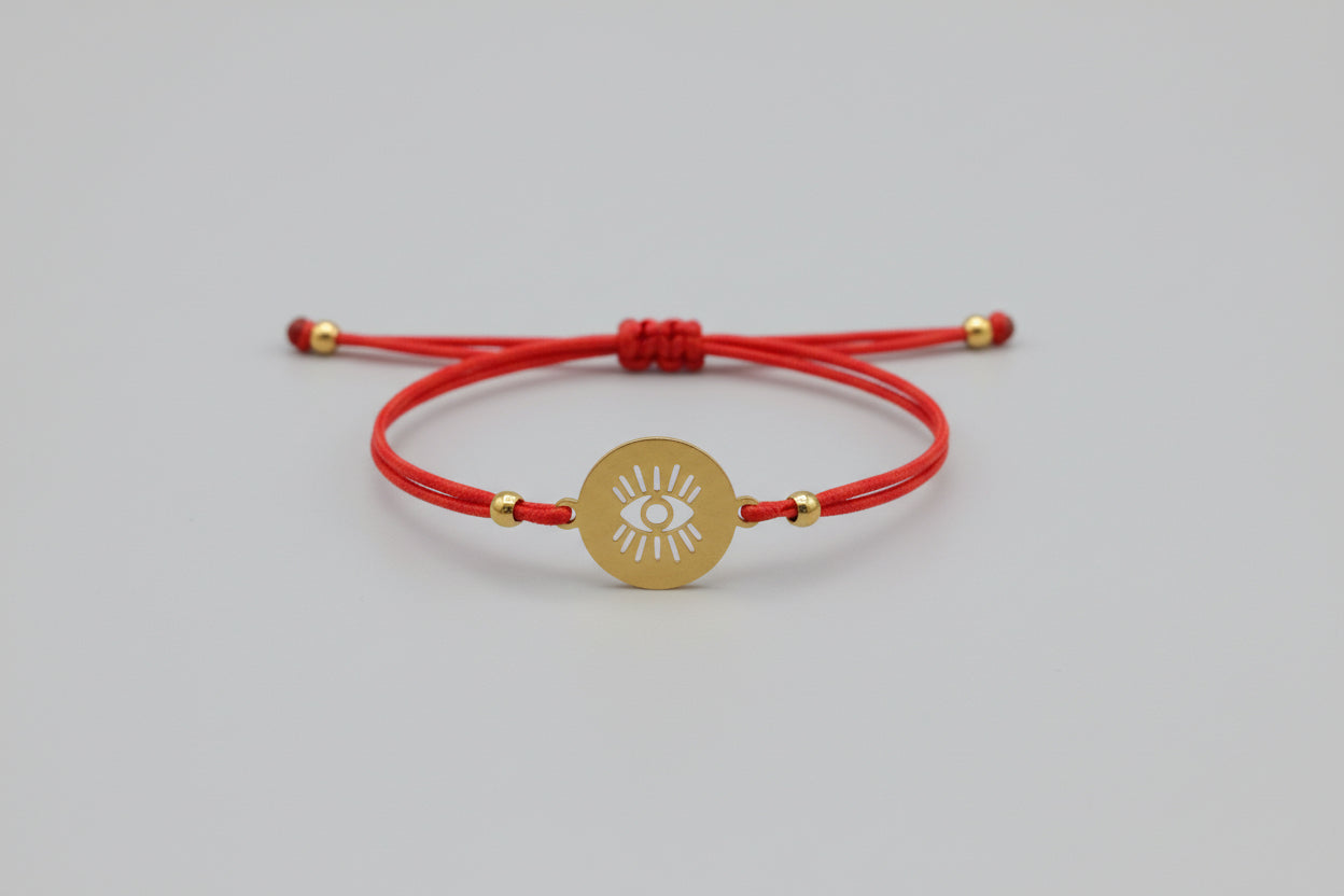 Pulsera elástica roja amuleto ojo acero