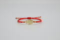 Pulsera elástica roja amuleto mano de Fátima acero dorada. IV A incluido