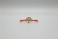 Pulsera elástica roja con árbol acero. IVA incluido