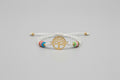 Pulsera de cuentas cristales blanco con árbol. IVA incluido