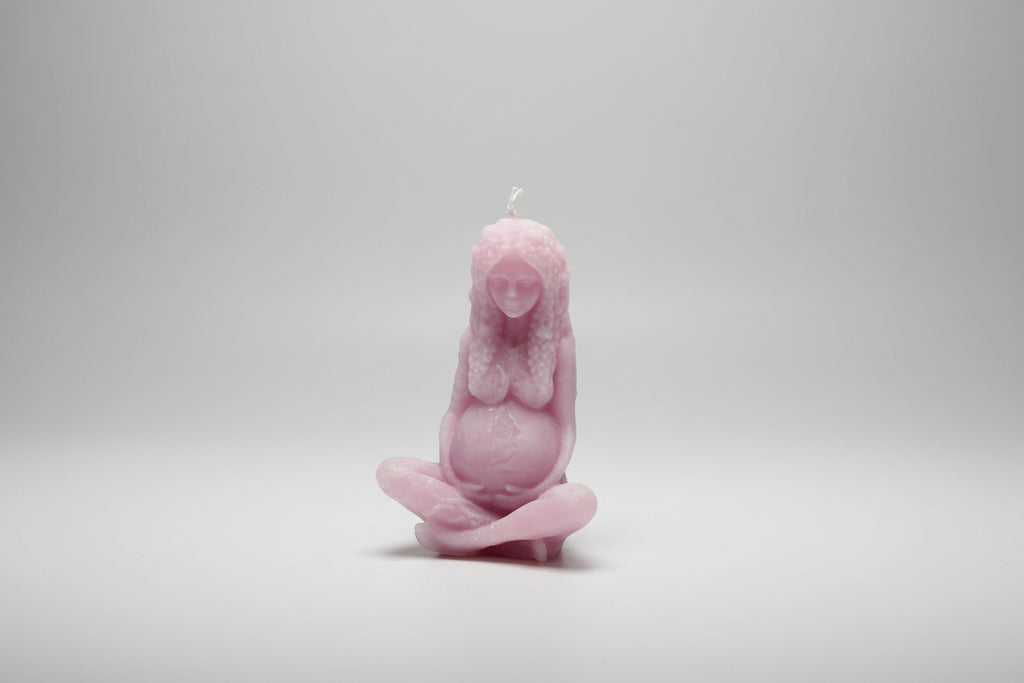 Vela Madre Tierra violeta 11X7.cm. IVA incluido.