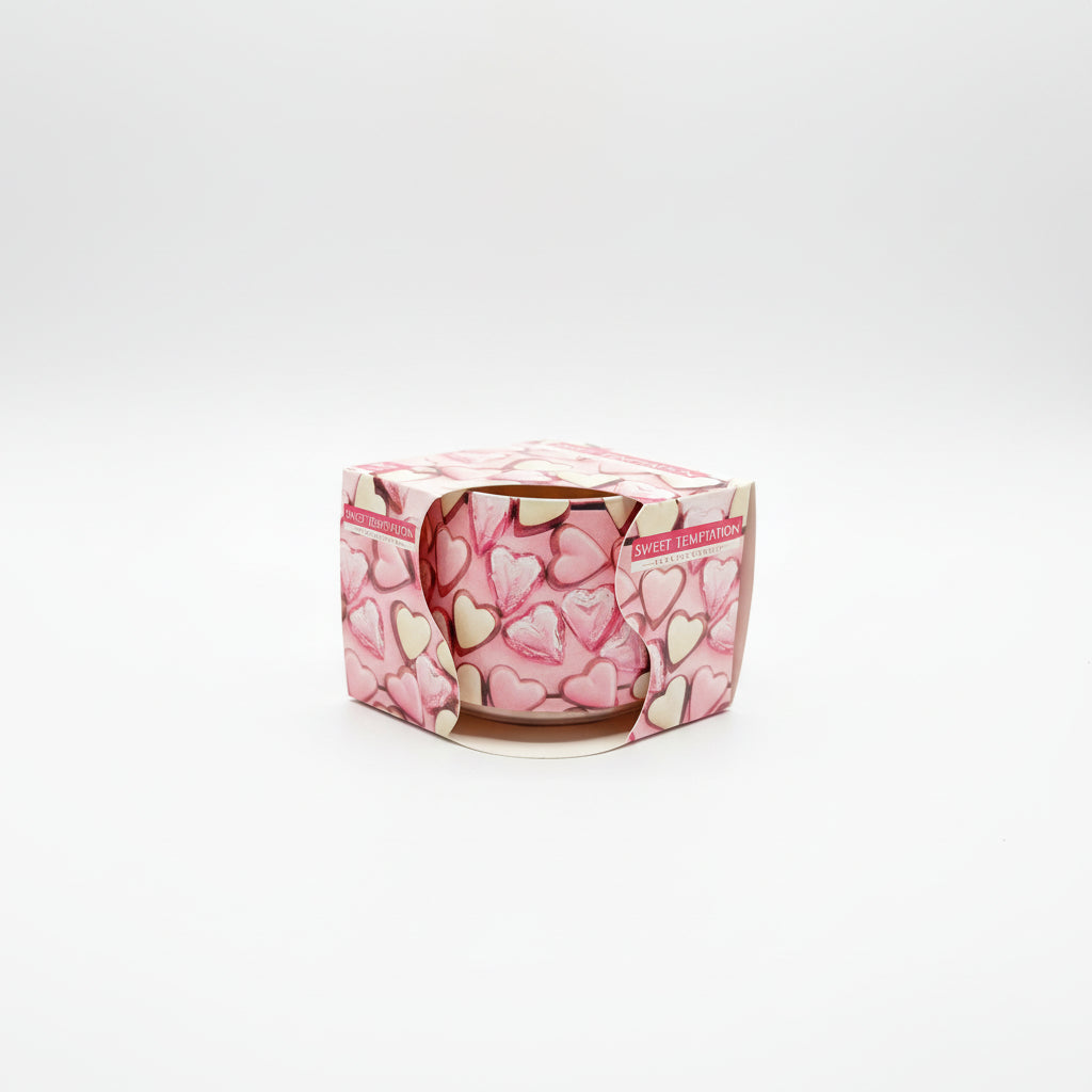 Vela en vaso de cristal decorado con corazones, aroma nata y fresas. IVA incluido.