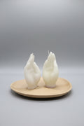 Vela forma de mano blanca. 11X3 cm. IVA incluido.